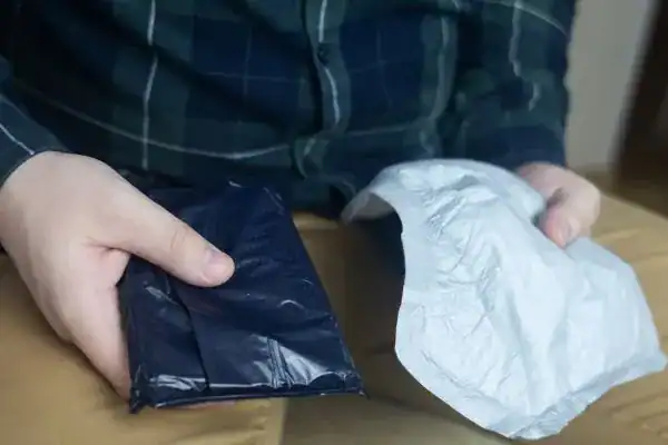 image of man holding stool incontinence London products